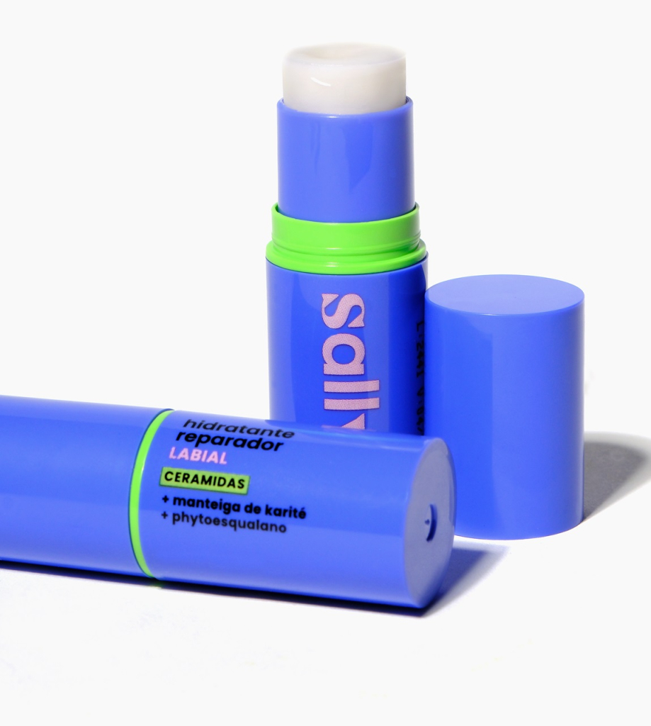 hidratante reparador labial: uma embalagem em bastão azul, com detalhes em verde
